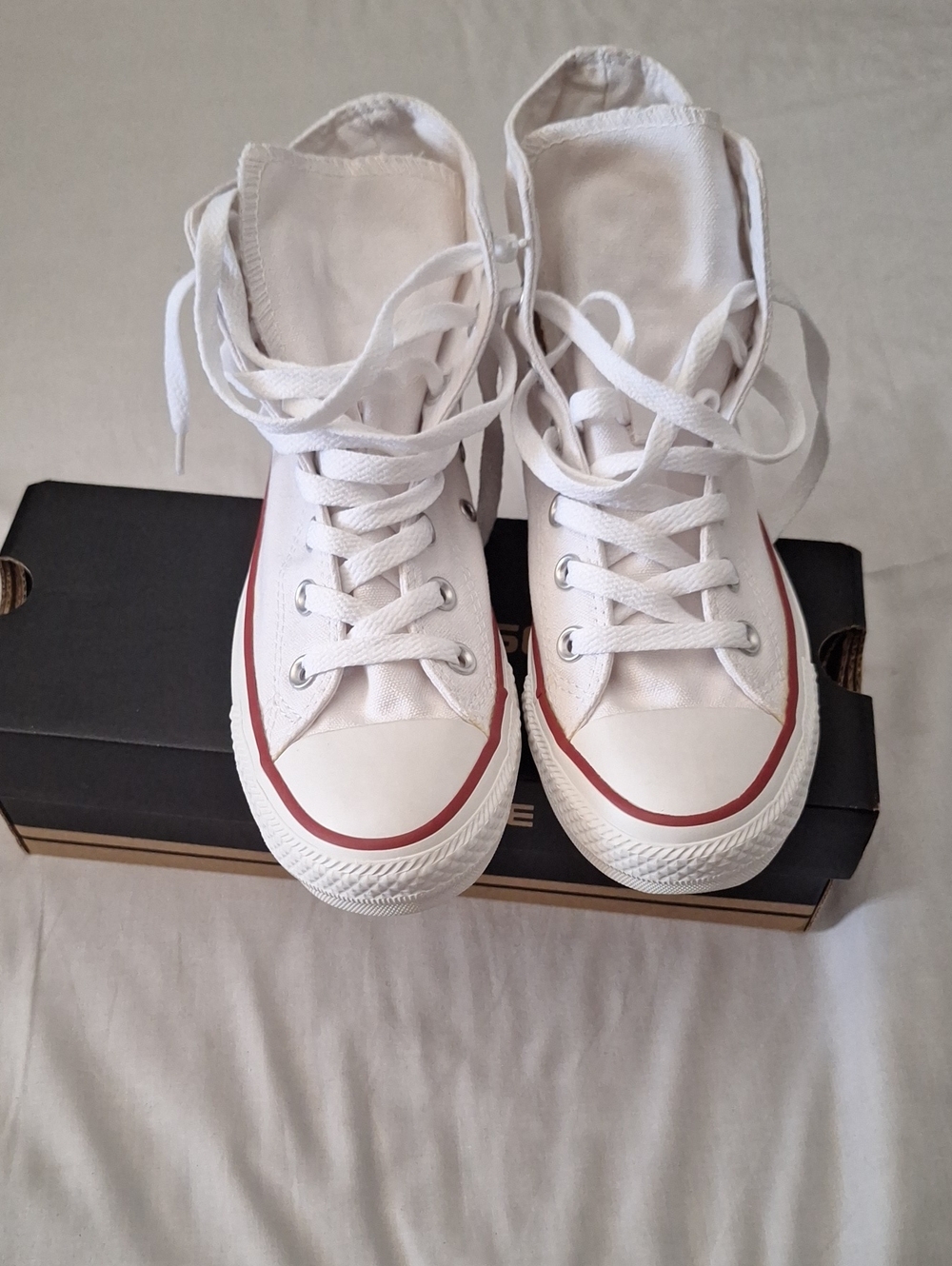 Converse White High-Top Sneakers with Red Stripe
